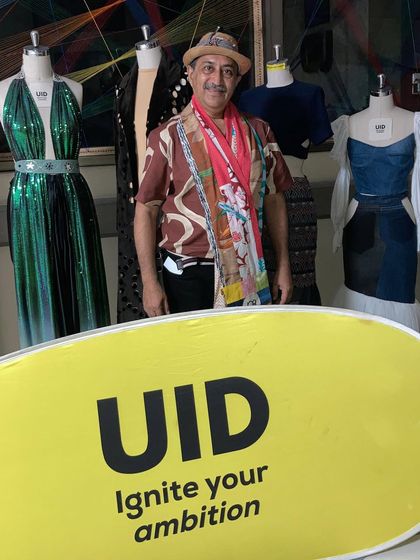 Posing at the Unitedworld Institute of Design (UID) during a workshop focused on igniting ambition through sustainable design.