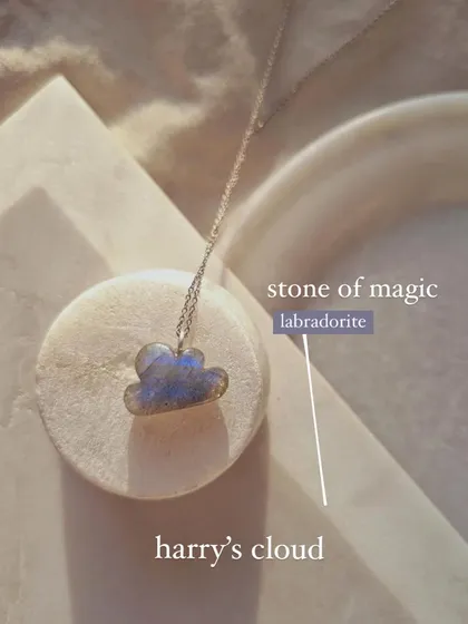 A different angle of "Harry's cloud," the labradorite pendant. Its magical energy is perfect for anyone looking to enhance their meditation practice or connect with their inner power.