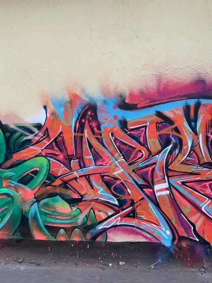 My 'bijli flow' style. This piece is all about fluid movement and electric colors, with sharp, pointed letters that seem to crackle with energy.