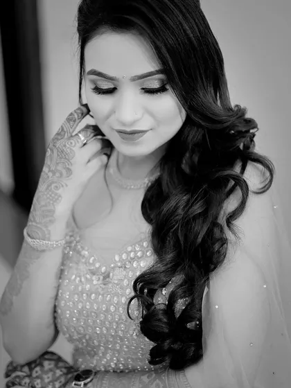 A classic black and white portrait that adds a timeless and emotional quality to the series.