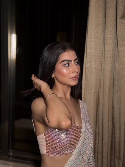 My 'desi girl' Twinkle, looking stunning in a sequin saree. The makeup was kept soft and glowy to let the outfit shine, with a focus on luminous skin and a simple nude lip.