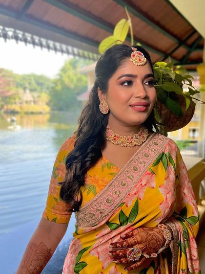 A soft and fresh Haldi makeup look. The makeup is natural and glowing, perfect for the ceremony.