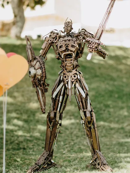 A towering robot warrior, crafted from scrap metal, was another of the incredible art installations that transformed the venue into a surreal festival ground.