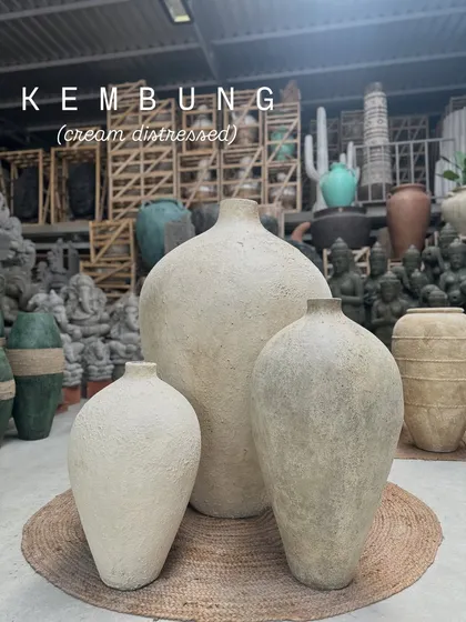 The 'Kembung' trio is one of my favorite sets for creating a layered, sculptural look. Their organic shapes and cream distressed finish make them beautiful art pieces that can stand alone or hold dried botanicals.