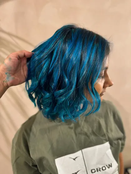 Another angle of the mermaid blue bob, showing how the color catches the light.