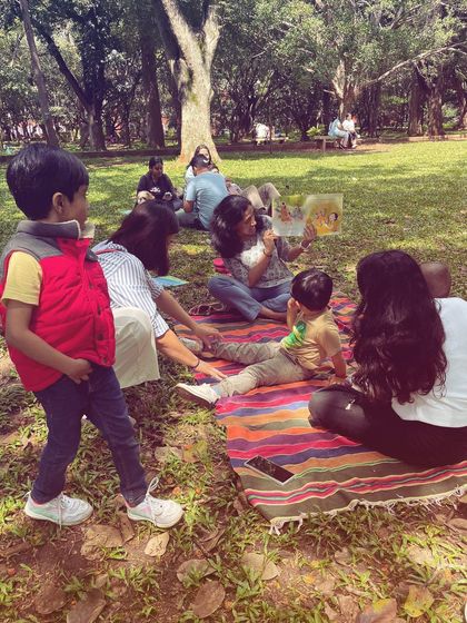 A series of photos from our 'Storyscapes 16' session, capturing the authentic, unposed moments of our circle. You can see children listening, playing, and interacting naturally, which is the essence of our child-led storytelling approach.