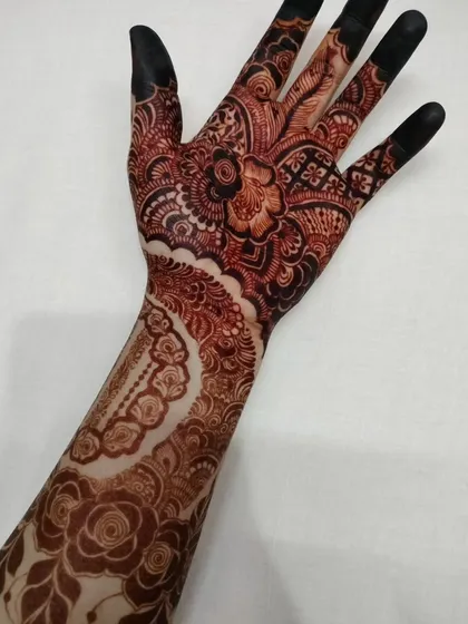 The beautiful, dark stain of this intricate cuff and rose design. The color is rich and even, a testament to the quality of my homemade paste.