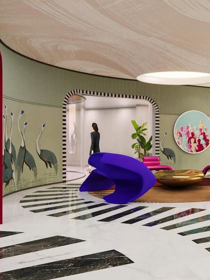 A view through the bold red archway, showing how we use architectural elements to frame different zones and create a sense of journey through the space.