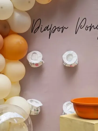 Another "Diaper Pong" setup, this time for a boho-themed party with an earthy color palette.