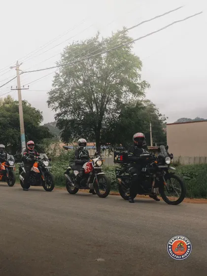 A long, organized line of our members' bikes on the ride to Bhoga Nandishwara Gudi. This shows our commitment to riding in a safe and disciplined convoy, a hallmark of all BMR rides.