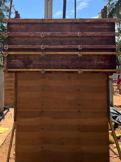 The formwork for a rammed earth wall is set up at our Morjim villa project in Goa. This is the first step in giving shape to the earth.