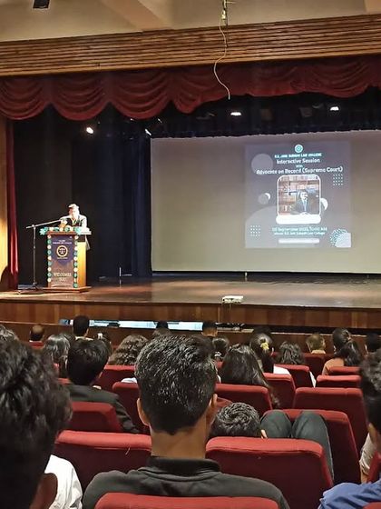 Addressing a large audience of law students in the auditorium of S.S. Jain Subodh Law College.