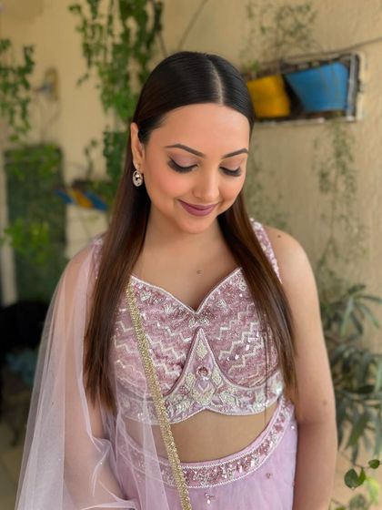 A close-up of the pink monochrome glam, showing the soft, blended eyeshadow and flawless skin.