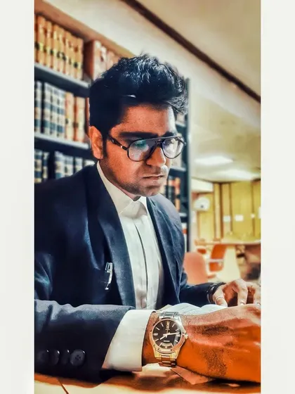 In the law library, where battles are planned. Never underestimate the depth of calm waters.