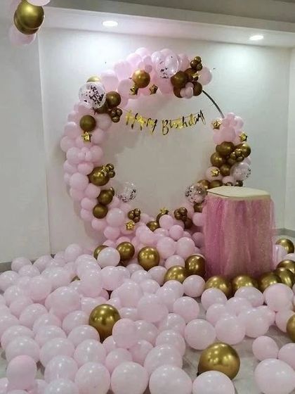 The pink and gold birthday setup, perfect for creating a memorable surprise.
