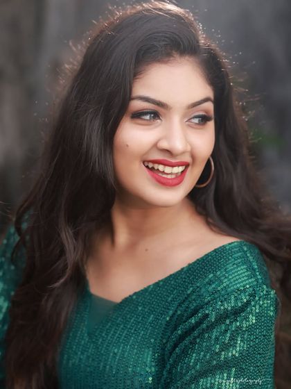 A series of portraits featuring a model in a stylish green sequin and black dress. The combination of outdoor and rustic indoor settings provides a variety of backdrops for this modern look.