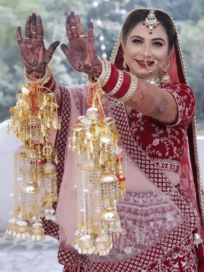 A stunning professional photo of one of my brides on her wedding day, showing how the mehndi complements her entire look.