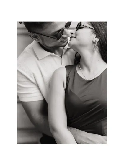 A classic black and white embrace. This pre-wedding portrait of Alicia and Jeff is simple, timeless, and full of emotion, focusing on the way they hold each other.