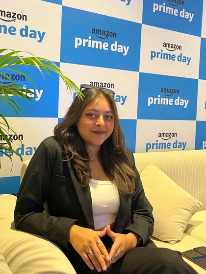 Taking a moment at the Amazon Prime Day event. It's important to be professional, but my personality always shines through.