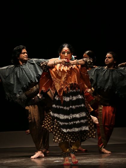 A central moment in 'Antariksha Sanchar', where my character is surrounded by her fellow performers. This production was a true collaboration, blending my choreography with the vision of my son, Avinash Kumar, and his studio.