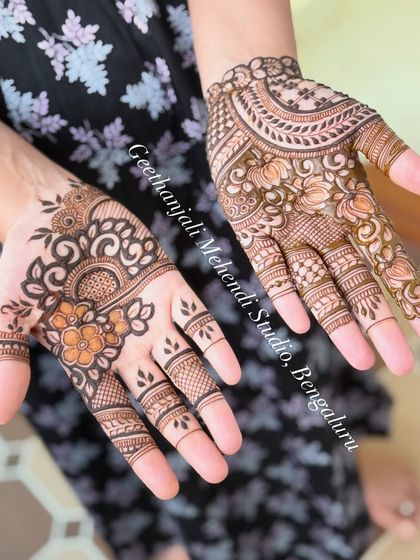 A beautiful Arabic-style design for a baby shower. This floral and paisley pattern flows diagonally across the back of the hand for an elegant look.
