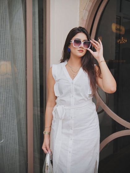 "Hello summers." A chic all-white look with a button-down midi dress from GoSooti, perfect for a sunny day.