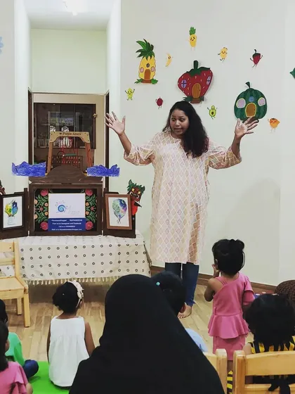 Storytelling for our tiniest tykes! Here I am, using big gestures and our Kamishibai stage to tell a musical story to a preschool group. We tailor our energy and activities to be perfect for the 3-5 year age group.