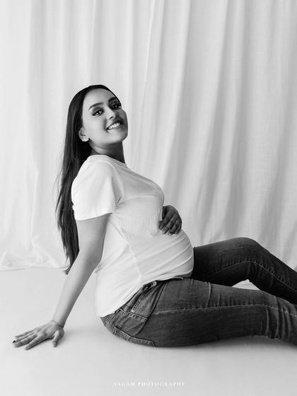 The simple joy of a relaxed, casual portrait is perfectly preserved in this clean black and white image.