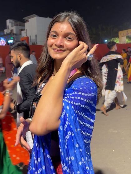 A candid moment during a Navratri celebration. I can bring this festive spirit to your event.