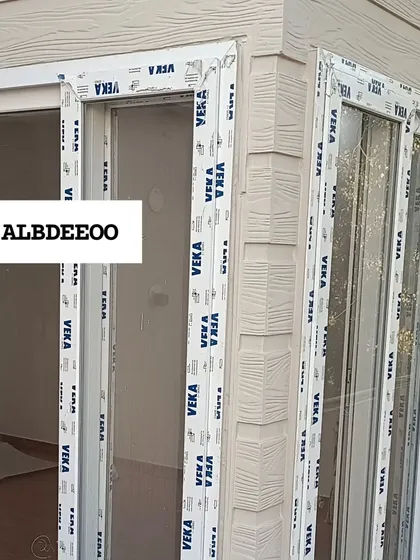 A series of detailed shots of a terrace prefab house's exterior. These images focus on the wood-textured cement plank elevation, modern ceiling lights, and high-quality VEKA window frames.