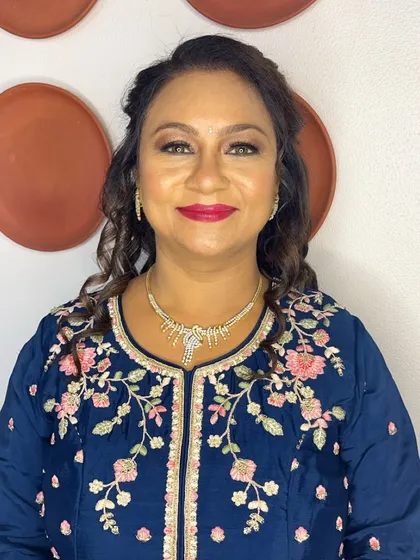 The final look is polished and festive, perfect for any party or wedding event.