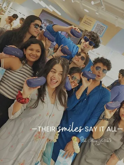Their smiles say it all. This photo captures the pure happiness of a group enjoying their freshly personalized sunglass cases at a Lenskart brand event. It’s this connection and joy that makes every event unforgettable.