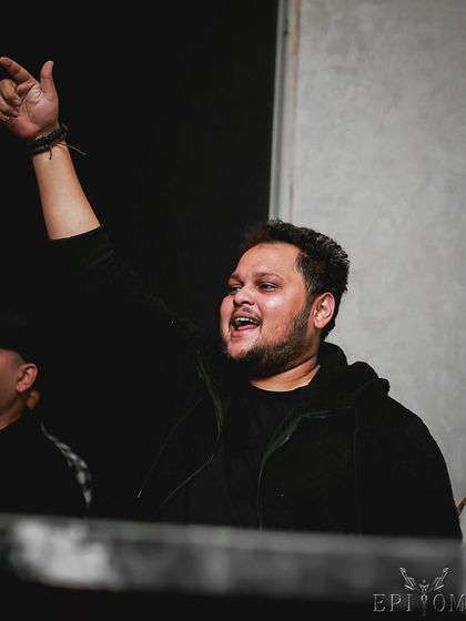 A moment of pure joy and energy. This shot captures my passion for performing and connecting with the audience.