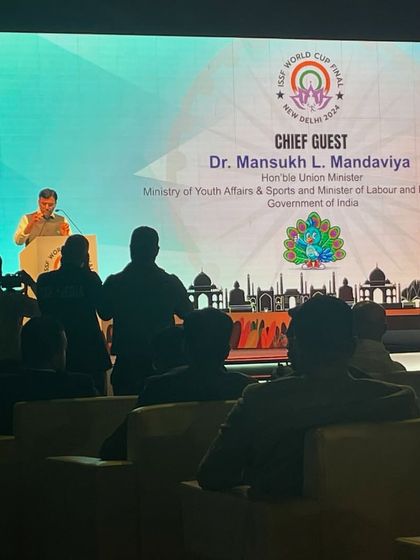 The view from my station as the Union Minister, Dr. Mansukh L. Mandaviya, addresses the audience at the ISSF World Cup Final.
