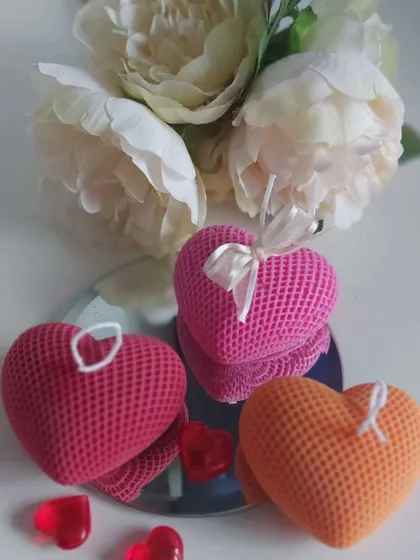 These textured heart-shaped pillar candles are a lovely choice for Valentine's Day, anniversaries, or as wedding favors. Their unique honeycomb texture adds a touch of sophistication.