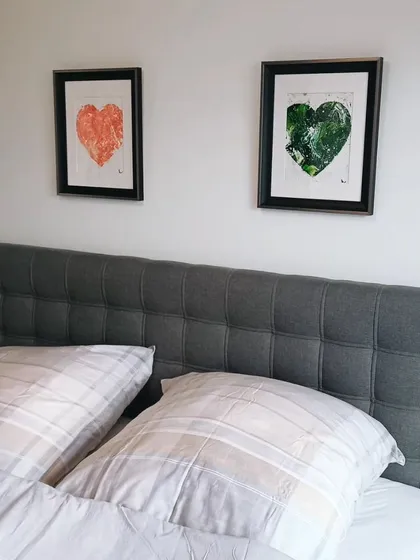 Seeing my art in its new home is one of the best feelings. This client chose a pair of my heart paintings to create a serene and loving atmosphere above their bed. This is how art can transform a room, adding personality and a focal point that speaks to you.