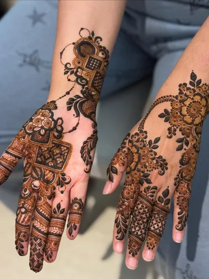 This modern Indo-Arabic design combines bold floral work with delicate, trailing patterns. It's a perfect choice if you love a style that is both striking and elegant with beautiful use of space.