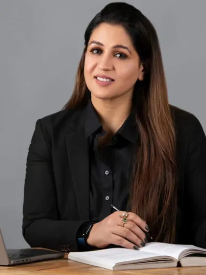 A professional photo of me at my desk. This is where the planning for my foundation's initiatives and legal cases takes place.