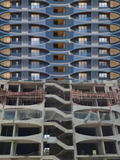 This image shows our process of turning a detailed 3D visualization into a tangible reality. The comparison highlights the precision of our design and construction management for a residential tower with a complex, undulating facade.