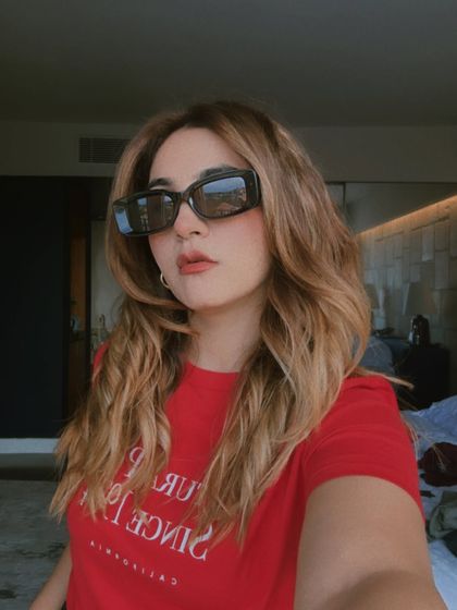 A final shot of the Gucci sunglasses, showcasing their modern yet classic design. They are the perfect accessory to add a touch of luxury to your everyday style.