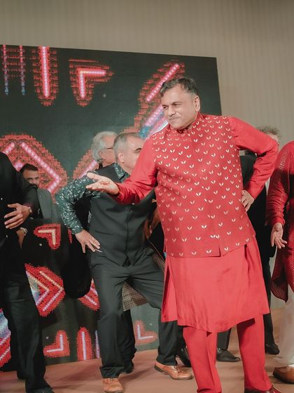 Uncles and fathers bringing their A-game to the sangeet stage. We make sure the men of the family have just as much fun.
