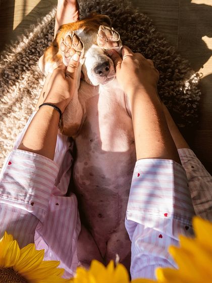 A playful moment from Rrari's birthday shoot, with her mom covering her eyes for a game of peek-a-boo.