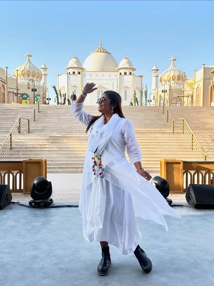 Looking towards the future, shielding my eyes from the bright sun and even brighter possibilities. This journey in Riyadh with my team taught us so much about perseverance and focus.