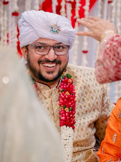The pure joy on the groom's face says it all. Capturing the happiness of not just the couple, but their families, is a core part of my wedding photography philosophy.