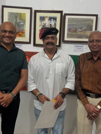 A group photo with actor Shri Ajay Purkar and my father at my painting exhibition.