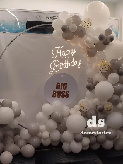 A close-up view of the chic office party decoration, highlighting the texture and color combination of the balloons.