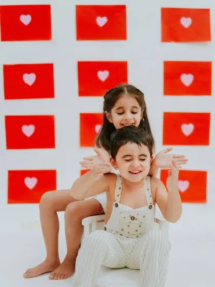 A playful "guess who" moment. I love encouraging kids to be themselves during our sessions, which leads to the most natural and joyful photos.