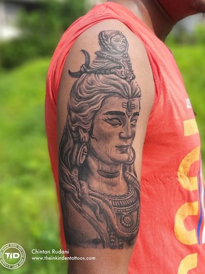 Another angle of the Adiyogi Shiva tattoo, taken outdoors in natural light.