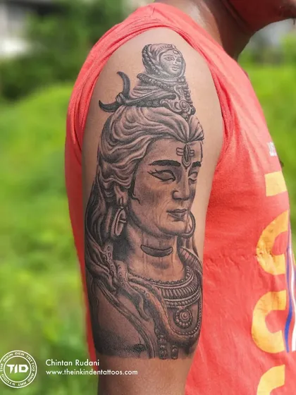 Another angle of the Adiyogi Shiva tattoo, taken outdoors in natural light.
