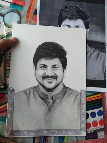 Here is a finished portrait held up against the original reference photo. This comparison shows how I translate a black and white photograph into a hand drawn graphite sketch.